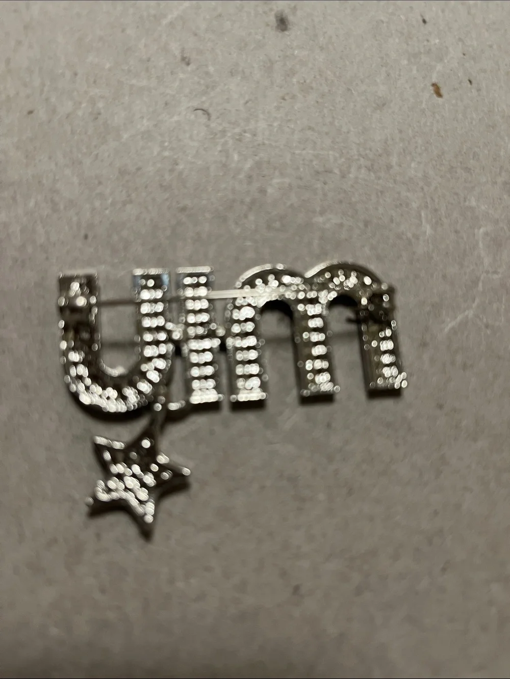 Miu Miu Silver Crystal 'MIU' Cuff Link with Star Charm